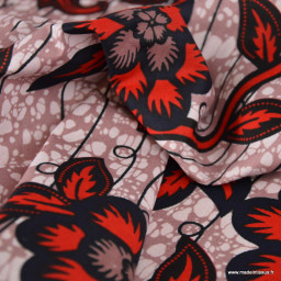 Tissu wax coton Zola Fleurs rouges sur fond rose poudré