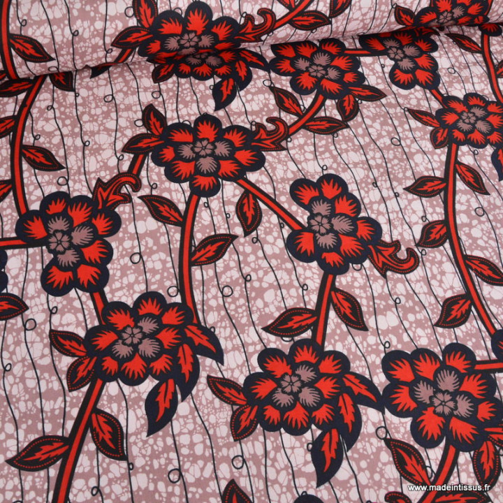Tissu wax coton Zola Fleurs rouges sur fond rose poudré