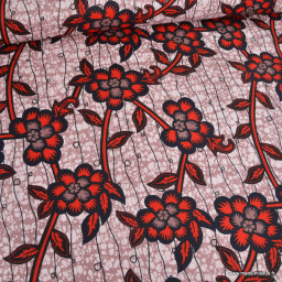 Tissu wax coton Zola Fleurs rouges sur fond rose poudré