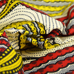 Tissu wax coton Nala motifs graphiques jaune et rouge