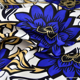 Tissu wax coton Imani motif grandes fleurs bleu électrique sur fond blanc