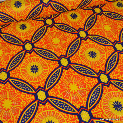 Tissu wax coton Sura motifs graphiques orange et doré