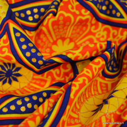 Tissu wax coton Sura motifs graphiques orange et doré
