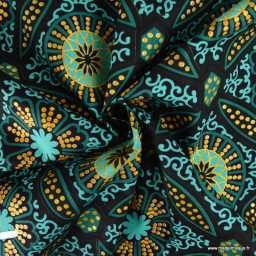 Tissu wax coton Sura motifs graphiques vert et or