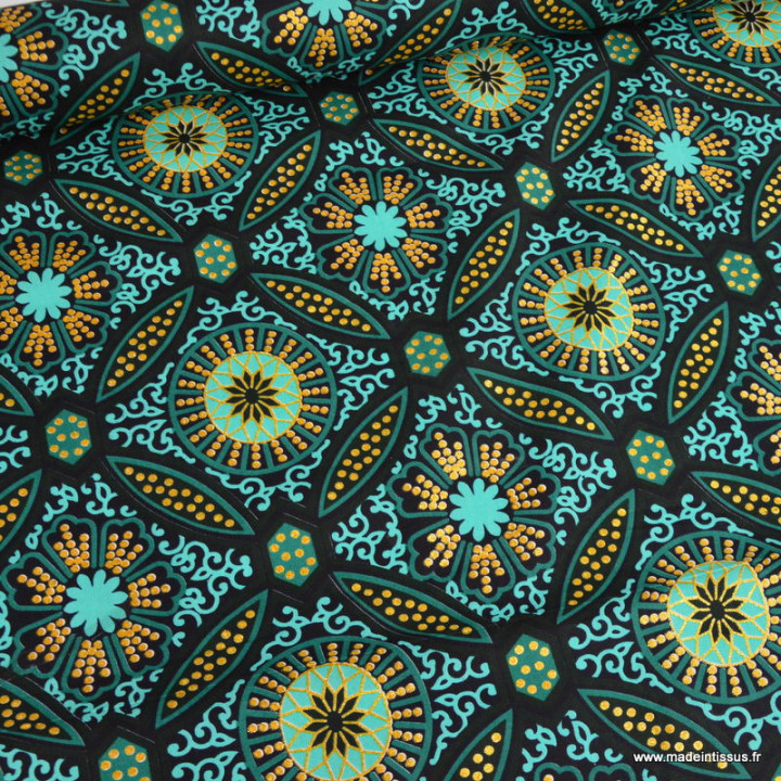 Tissu wax coton Sura motifs graphiques vert et or