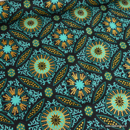 Tissu wax coton Sura motifs graphiques vert et or