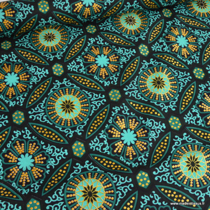 Tissu wax coton Sura motifs graphiques vert et or