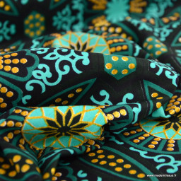 Tissu wax coton Sura motifs graphiques vert et or