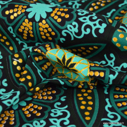 Tissu wax coton Sura motifs graphiques vert et or