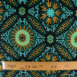 Tissu wax coton Sura motifs graphiques vert et or