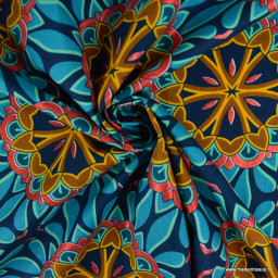 Tissu wax coton BAMORI – Rosaces turquoise et ocre sur fond bleu marine