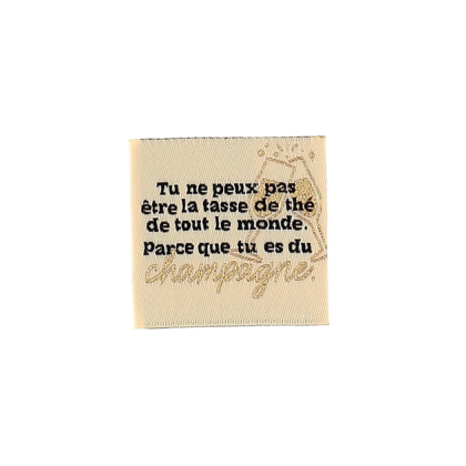 Étiquette tissée à coudre « Tu es du champagne » – Écru et doré