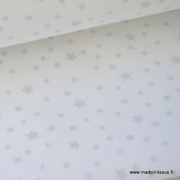 Tissu coton imprimé dessin étoiles argentées sur fond blanc