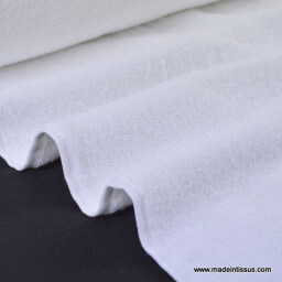 Tissu Eponge coton blanc lisiere cousue fermée au mètre