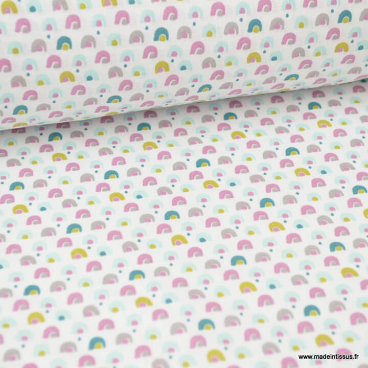 Tissu coton imprimé arc en ciel bleu et rose