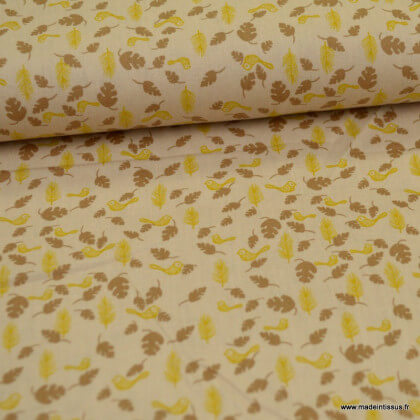 Tissu coton popeline motifs feuilles et oiseaux fond beige