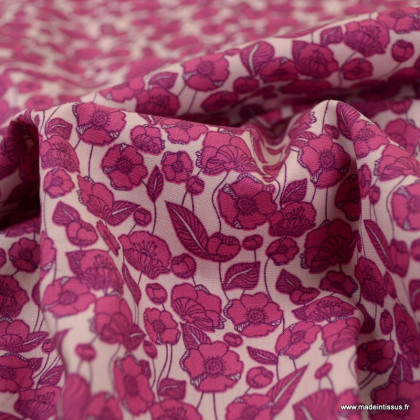 Tissu coton popeline motifs fleurs fuchsia fond rose