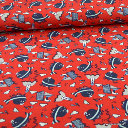 Tissu jersey motifs poissons, phares et bateaux fond rouge - Oeko tex