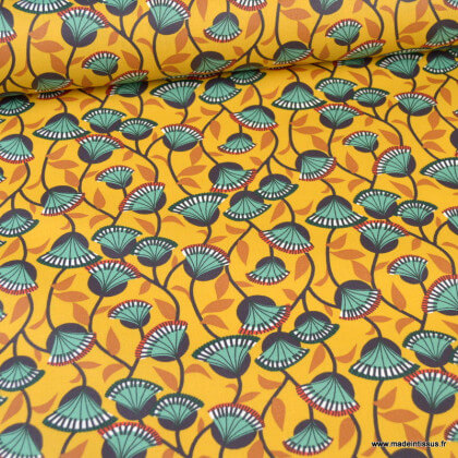 Tissu coton Enduit Nyer motifs fleurs fond safran -  Oeko tex