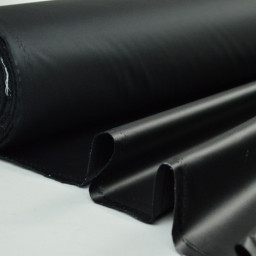 Tissu imperméable étanche polyester enduit acrylique noir .