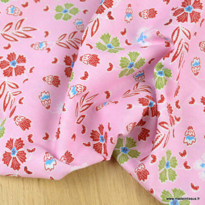 Tissu Popeline motif fleurs fond rose - oeko tex