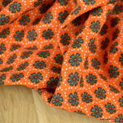 Tissu Popeline motif fleurs fond orange - oeko tex