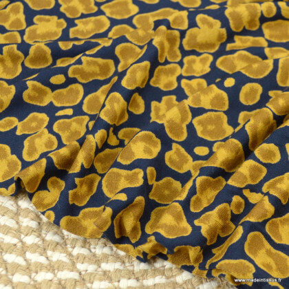 Tissu Jersey de Viscose motif léopard fond marine