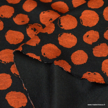 Tissu Jersey Milano motif pois brique fond noir