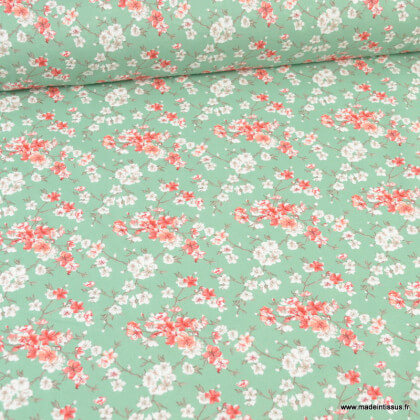 Tissu cretonne coton Mume motifs fleurs japonaises Sakura fond vert