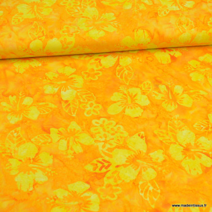 Tissu Batik fond motifs fleurs jaune et corail
