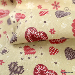 Tissu coton Enduit Jolicoeur motifs coeurs fond beige - Oeko tex