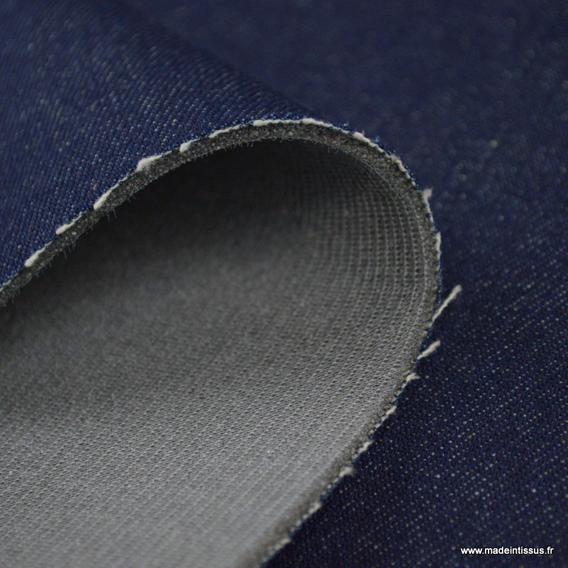 Tissu jean bleu envers mousse 3mm.