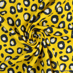 Tissu Viscose lin motifs léopard fond moutarde