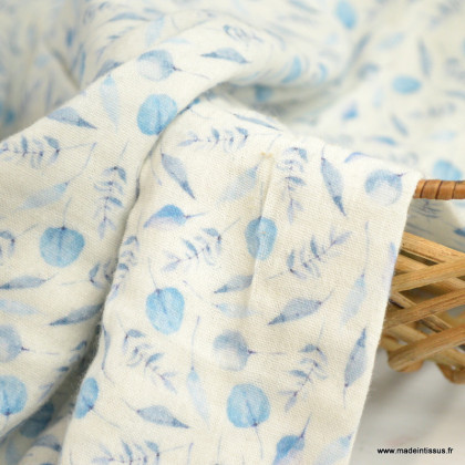 Double gaze de coton Bio & oeko tex motifs feuilles bleues fond Blanc cassé