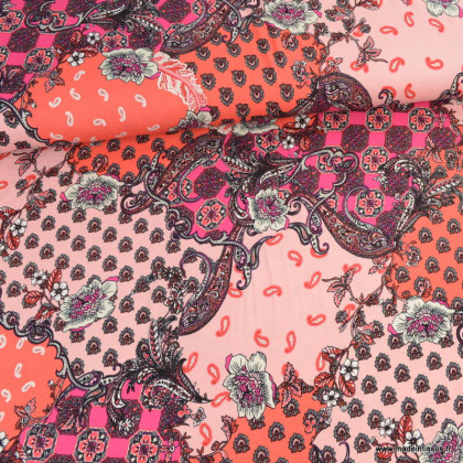 Tissu Jersey de Viscose motif fleurs corail et rose