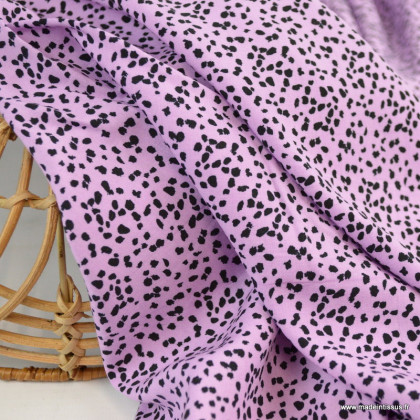 Tissu Viscose motifs léopard fond rose