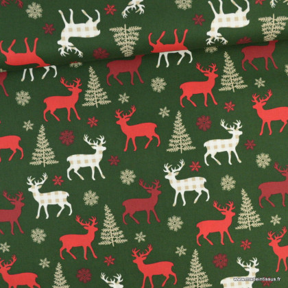 Tissu coton motifs sapins de Noël et cerfs fond vert