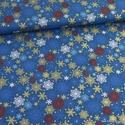 Tissu de Noël motif Etoiles de neiges or fond bleu - Oeko tex