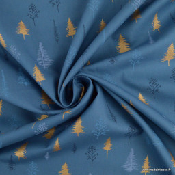 Tissu de Noël motif sapins or et arbres fond bleu - Oeko tex