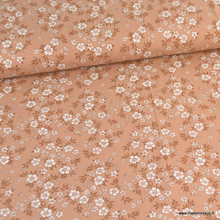 Tissu jersey motifs fleurs fond rose nude - Oeko tex