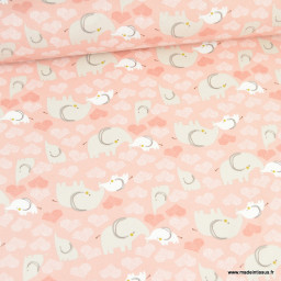 Tissu cretonne coton Febbey motifs éléphants et coeurs fond rose fané -  oeko tex
