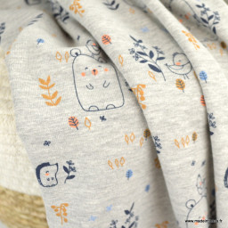 Tissu jersey Poppy motifs oursons, oiseaux et feuillage gris chiné - oeko tex