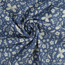 Tissu Jean Denim motifs fleurs et papillons fond bleu