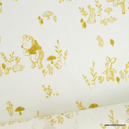 Tissu Disney en coton motif Winnie l'ourson - Oeko tex
