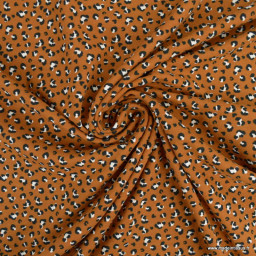 Tissu jersey motif léopard fond camel - oeko tex