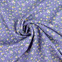 Tissu popeline de Viscose motif fleurs fond mauve