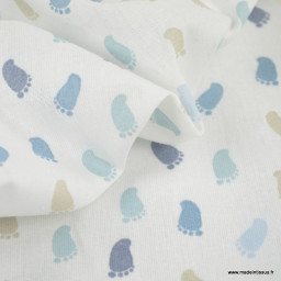 Tissu cretonne coton Peton motif petits pieds bleus