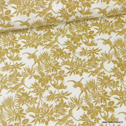 Tissu cretonne coton Ouakiri motifs singes et feuilles exotique moutarde
