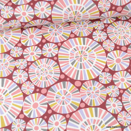 Tissu coton enduit motifs graphique rosace fond bordeaux