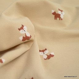 Tissu jersey motif petits renards fond beige - Oeko tex standard 100